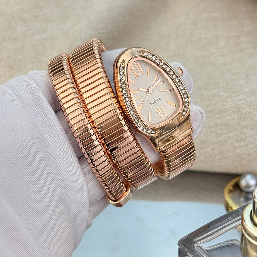 Women's fashion high quality Serpentine alloy watch with diamond case Celebrity style high-grade quartz bracelet watch