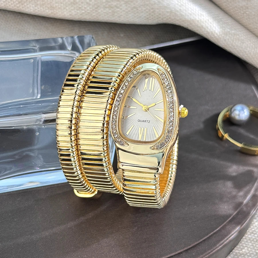 Women's fashion high quality Serpentine alloy watch with diamond case Celebrity style high-grade quartz bracelet watch